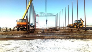 Аренда экскаватора погрузчика с ямобуром в Крымск цена от 1550 руб