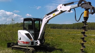 Аренда экскаватора погрузчика с ямобуром в Крымск цена от 1550 руб